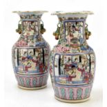 A pair of late 19th century Chinese Famille Rose vases