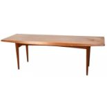 GORDON RUSSELL; a mid 20th century teak coffee table, with rectangular top on tapered legs, height