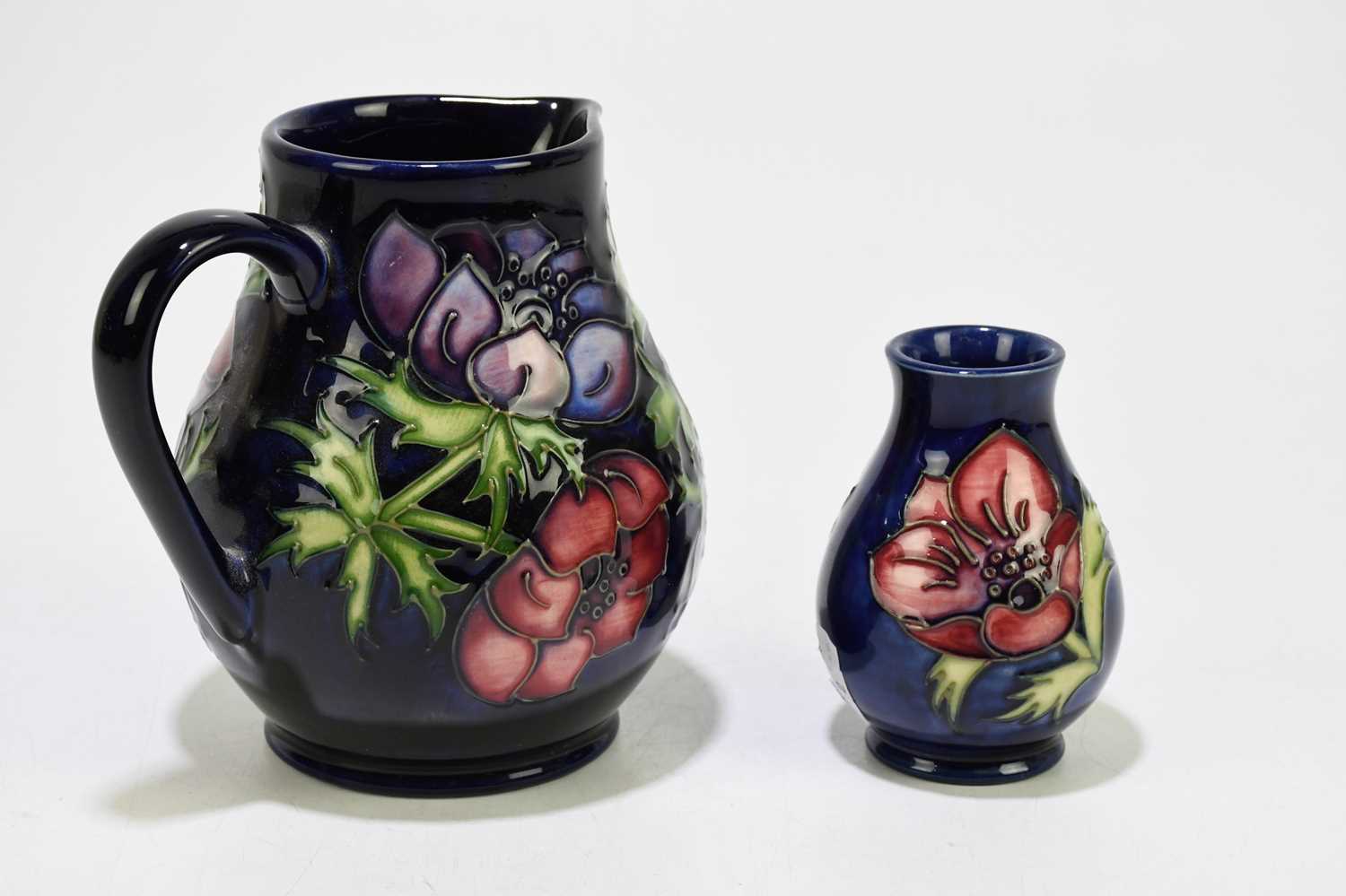 MOORCROFT; two pieces decorated in the 'Anemone' pattern, comprising a jug, height 15cm, and a squat - Image 2 of 6