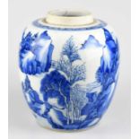 A Chinese Kangxi blue and white ginger jar, decorated with a landscape of rockwork and figures,