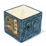 JANE FITZGERALD FOR TROIKA POTTERY; a cube with abstract decoration to each of the four sides in a