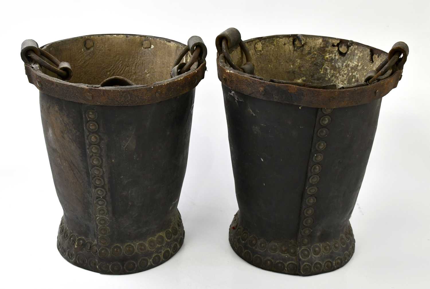 A pair of leather fire buckets, with brass studs, height 31cm.