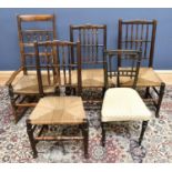 A 19th century rush seated spindle back rocking chair, together with a Harlequin set of three