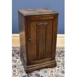 A mid 20th century oak bedside cabinet, height 67cm, width 36cm, depth 34cm.Condition Report: Top is