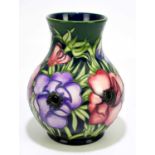 MOORCROFT; a 'Anemone' pattern vase, impressed marks and dated 2002, height 23cm.Condition Report: