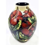 PHILIP GIBSON FOR MOORCROFT; a limited edition globular vase decorated in the 'Crimson Nectar'