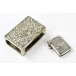 A late Victorian hallmarked silver match box sleeve, decorated with floral detailing, London 1898,
