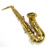 C G CONN; an alto saxophone, serial number 129147, cased.