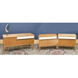 E GOMME FOR G-PLAN; a teak and laminated three piece bedroom suite comprising dressing table with