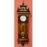 A walnut Vienna type regulator wall clock, with white enamel dial set with Roman numerals and