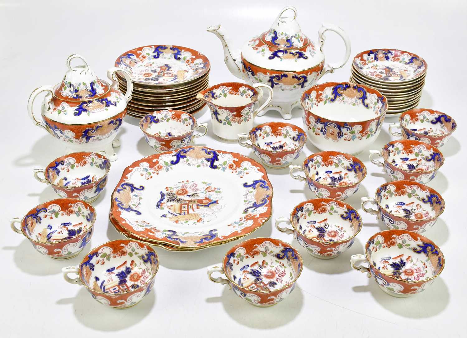 A 19th century Staffordshire Imari pattern part tea service decorated with a Mandarin palette,