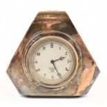 SMITHS; an electroplated cased mantel clock, the dial set with Arabic numerals, height 16cm.