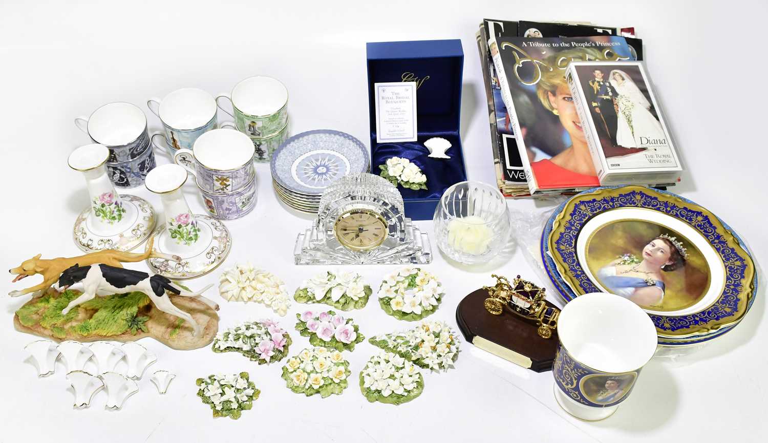 An assortment of decorative ceramics and glassware including a pair of Spode candlesticks produced