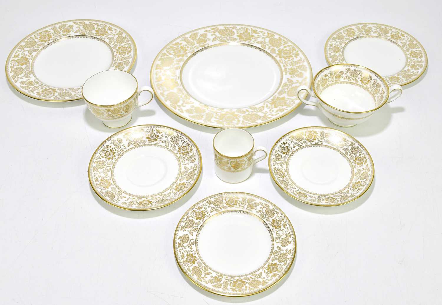 WEDGWOOD; a 'Gold Damask' pattern part dinner service comprising five dinner plates, five dessert