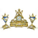 A French three piece clock garniture, the clock decorated with hand painted floral panels, the