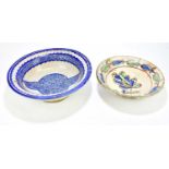 An early 19th century cream ground bowl decorated with splashes of blue and green with a leaf motif,