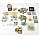 A small quantity of mixed coinage to include foreign coins and notes, crowns, commemorative coins,