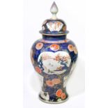 A large Japanese Imari vase of baluster form, with cover, height approx. 60cm.Condition Report: