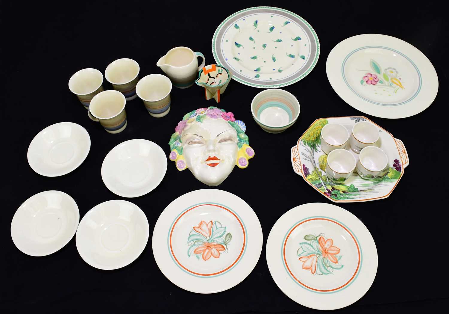 A small quantity of decorative ceramics to include a Clarice Cliff wall mask, a set of four Susie