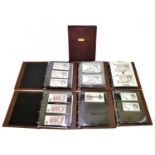 A collection of UK bank notes, ten shilling, £1, £5, £10, £20, and £50 denominations, including