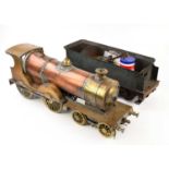 A copper and brass part built locomotive, together with tender and some spare parts, height of