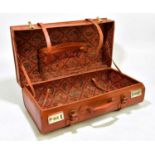 A tan leather suitcase, width 56cm, depth 30cm, height 20cm.