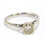 An 18ct white gold diamond set solitaire ring, approx size L, approx weight 2.6g.