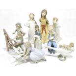 LLADRO; a collection of eight ceramic figures and models including 5363 'Girl Artist' (lacking