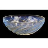 LALIQUE; an opaque glass bowl decorated in the 'Poissons' pattern, relief moulded mark to inside