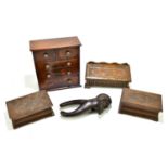 A 19th century mahogany miniature chest with contents, assorted buttons and sewing materials, plus