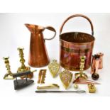 A small quantity of copper and brass to include a pair of brass candlesticks, a brass log bucket,