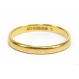 A 22ct gold wedding band, size O, approx weight 2.7g.