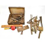 A small quantity of woodworking tools, to include chisels, a hand drill, spirit levels, etc.