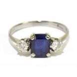 A white metal sapphire and diamond ring, size Q, approx weight 3g.