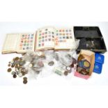 A collection of British and Continental coins to include various pennies, cased commemorative