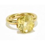 An 18ct yellow gold citrine set ring, 5.6g.Condition Report: Size F, stone approx length of stone