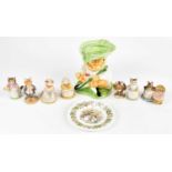 A small collection of Beatrix Potter figures, to include Beswick and Royal Doulton examples,
