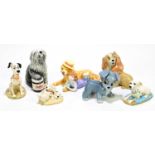 Seven various dog figures, including Wade and Royal Doulton (7)