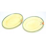 NEWPORT POTTERY; a pair of Clarice Cliff hand painted oval platters, 37 x 28cm.