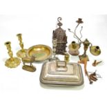 A small collection of metalware to include a pair of bass candlesticks, an electroplated tureen, a