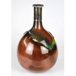 BRETBY; a large bottle vase with white metal collar, decorated with a majolica type glaze to the