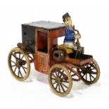 LEHMANN; a clockwork tinplate Post Carriage, in red, gold and black livery, with key (1).Condition