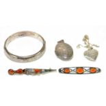 A Scottish hardstone dagger brooch, a further brooch, also a hallmarked silver bangle, and two