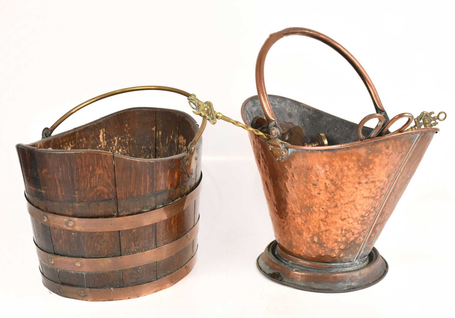 A copper coal bucket, together with a oak and brass bound log bucket.