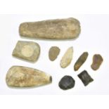 An interesting group of early worked stone and flint, including a large axe head, length 19.5cm.