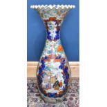 A large Japanese late Meiji earthenware vase of baluster form, with all over polychrome