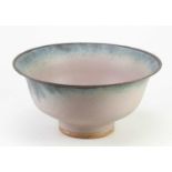 † ABDO NAGI (1941-2001); a stoneware bell shaped bowl covered in pink and mottled turquoise glaze