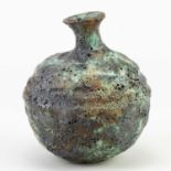 † AKI MORIUCHI (born 1947); a globular stoneware bottle with heavily textured surface, height 12.
