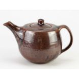 † GEOFFREY WHITING (1919-1988) for Avoncroft Pottery; a stoneware teapot covered in tenmoku breaking