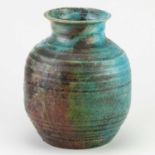 † ABDO NAGI (1941-2001); a raku jar with pronounced ribbing partially covered in mottled turquoise